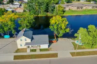 Waterfront Dock and Fire Pit - Charming Northwoods Retreat
