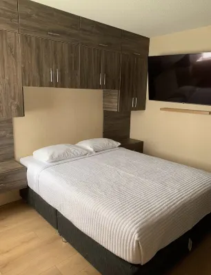 Cozy apartment with ocean view apartment in La Perla Отели в г. 