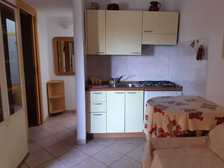 Apartment in San Teodoro a stone's throw from the sea and the town center Отели рядом с достопримечательностью «Parco pubblico con giochi per i bambini»