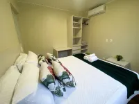 Casa com churrasqueira Ar e 2 quartos Hotels in Regiao Norte