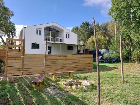 In the center of town, close to culture, the beach and the mountains. Pets accepted