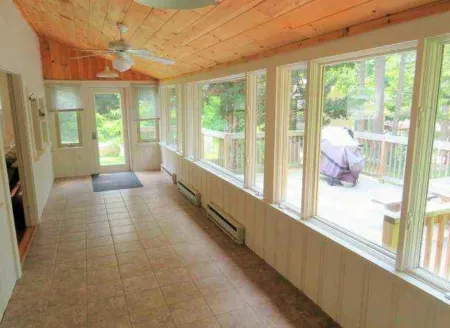 5 bed 4 bath in the Basin of Sebago Lake with 200 ft. of shared beach frontage