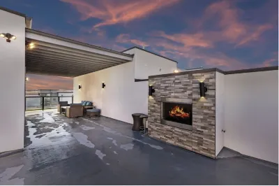 Contemporary Luxury Smart Home with Rooftop Oasis Hotels near Dallas College Brookhaven Campus Workforce & Continuing Education