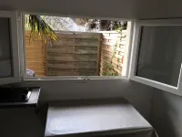 Self-contained studio, sunny courtyard, close to beaches and shops