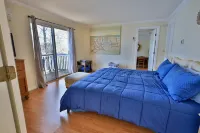 Lakefront Stunning Cape Cod Views w Private Lake Beach - Backyard is the Lake !