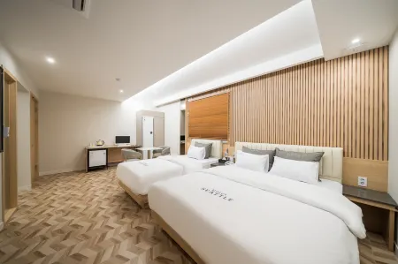 Muan Hotel Seattle Отели в г. Муана