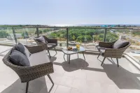 Sunlit Balcony & Coastal Charm by Sea N' Rent Hotels in Gesher HaZiv