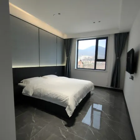 Beidahu Aoxue Inn Отели рядом с достопримечательностью «Phenix»