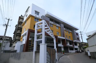 Meenakshi Inn Hotels near Venkateshwara Swamy Temple Pushkarani
