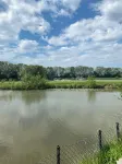 Kleine Ferienwohnung , Direkt am Deich und Hafen von Eckwarden mit Gartennutzung