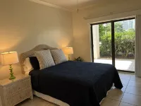 Ground floor condo with walk out access to docks, fishing piers and pool