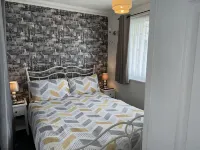 Modern South Facing Chalet , 5 Minutes From the Beach. Sleeps 5