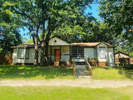 Spacious Modern Lake Retreat w/ Deck! Only a short Walk to Swimming and Fishing!