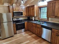 Secluded, beautiful cabin with hot tub and fire pit in heart of Hocking Valley!
