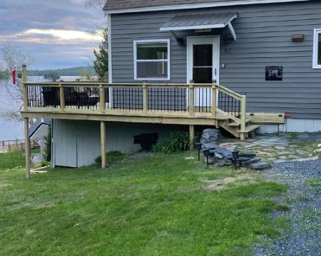 Beautiful lakefront camp with sunset view over big moose mountain 格林維爾酒店