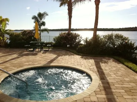 Top-Floor Waterfront Condo with Bay View + Pool and Hot Tub