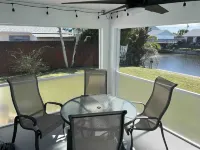 HEATED POOL- WATERFRONT/CANAL ACCESS - FISHING -SUNSETS -7 MI TO PUBLIC BEACH🏝️