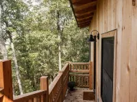 Japanese timberframe tiny house perched on side of Lookout Mountain Hotels in Dade County