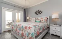 Steps from the Beach! Water view from each bedroom! Great for multiple families!