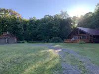 Serene Log Cabin Getaway! Close to Hiking, Snowmobile And Four Wheeler Trails.