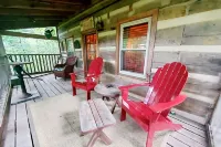Robin's Nest is an authentic log cabin built with hand-hewn logs from the 1800's