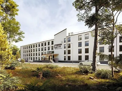 Platzhirsch Living فنادق في Kelsterbach