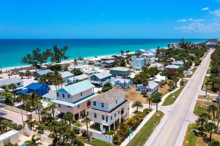 New Construction Modern POOL Home...LESS than 57 seconds walk to the BEACH!