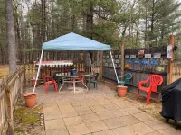 Rustic home on wooded lot, very private. Lake and dock access. Close to trails.