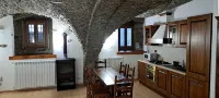 Finely renovated two-room apartment with typical stone vaults.