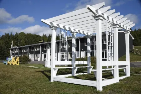 Travels Inn Victoria County Отели рядом с достопримечательностью «Кейп-Бретон-Хайлендс»