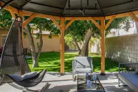 Luxury Oasis w Pool Hot Tub Fire Pit Games Big Yard Larrea by AvantStay