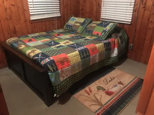 Indian Lakes Cabin with private beach and dock lake side