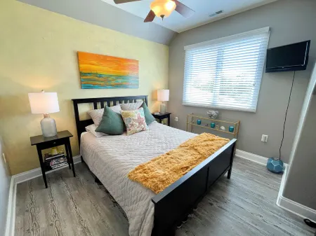 Charming Penthouse with Pool Access and Spacious Deck - Inviting Retreat