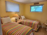 Cozy Cottage with Lake Views and Outdoor Fire Pit - Charming Escape Hotels in Long Lake Township