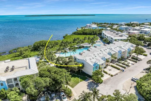 Lagoon Pool and Marina Amenities - Stunning Coastal Oasis