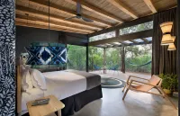 Mbazo Safaris Hotels near Black Rhino Game Reserve