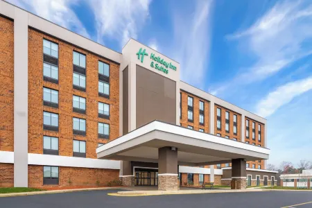 Holiday Inn & Suites Richmond - West End Отели в г. Три Чопт