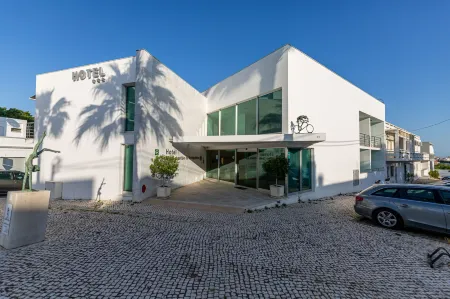 Hotel Sao Sebastiao de Boliqueime Отели в г. Падерне