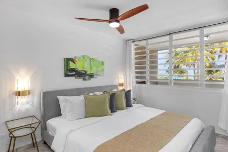 PLAYA AZUL1 2ND FLOOR BEACHFRONT LUX  DESIGNER CONDO.