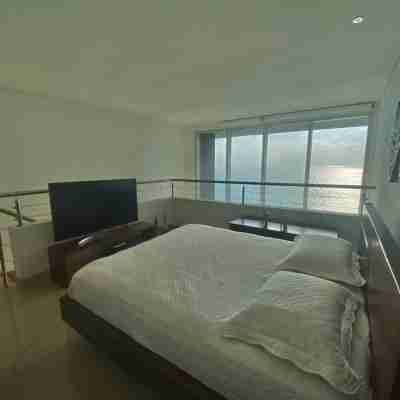 Exclusive beachfront loft apartment Rooms