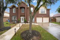 Spacious 4-bedroom house in charming Round Rock with WiFi, AC - Homestays