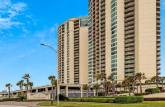 Beachfront! Coastal Designer Glam with Resort Amenities. Private Balcony & Grill