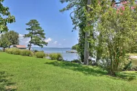 Romantic Waterfront Abode with Patio & Dock! - 3-Star