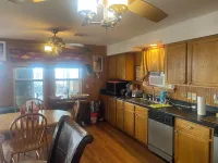 Spacious 5-bedroom lodge in brilliant Delacroix with AC, WiFi