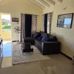 Charming 1-bedroom house with WiFi, AC in nice Old Harbour Hotels in Old Harbour