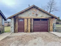 The Stone Schoolhouse - Gated Lakefront Acreage with views and historic charm