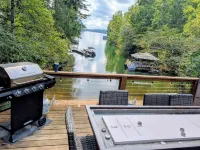 Lakefront Private Cove Retreat w/ Sandy Beach, Dock, Hot Tub + Boat & Ski Option