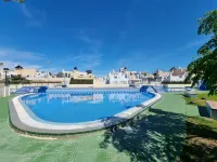Charming Upper Bungalow with Terrace and Communal Pool in Torrevieja