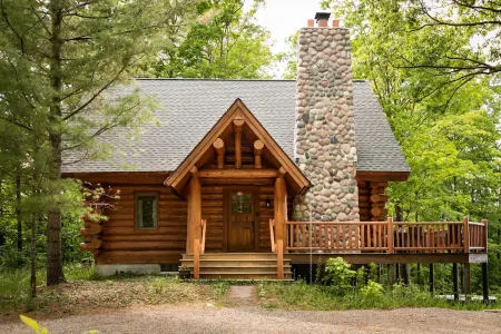 Watch the Snow Fall over Lake Michigan from a Hot Tub at Our Cabin in the Woods!
