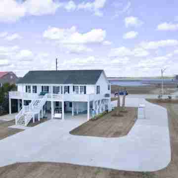 Enjoy a 3-bedroom waterfront vacation home just 10 minutes from Emerald Isle Hotel Exterior